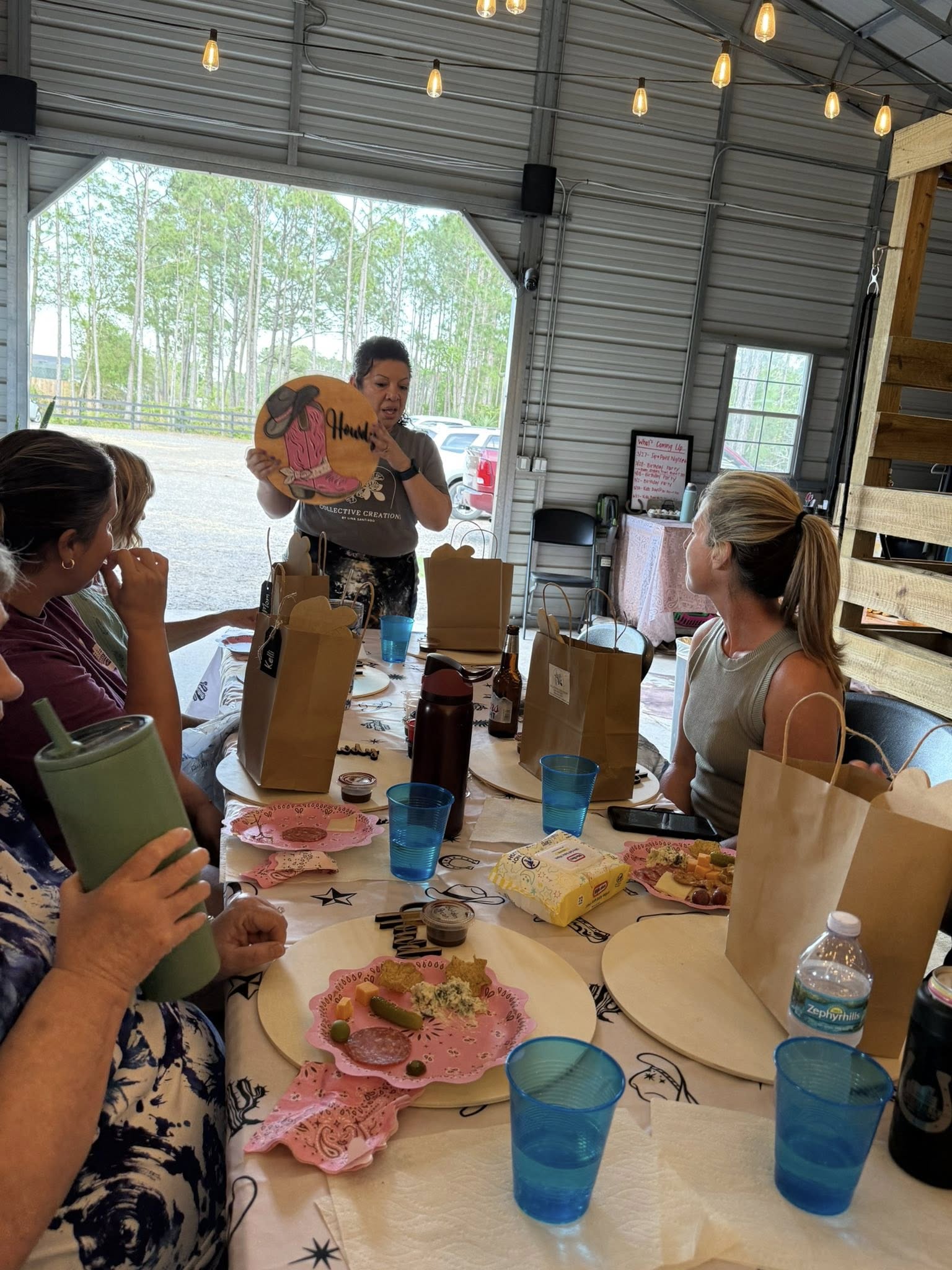 Guests participating in a ladies night activity event at Rodeo Stables in Ormond Beach, Florida
