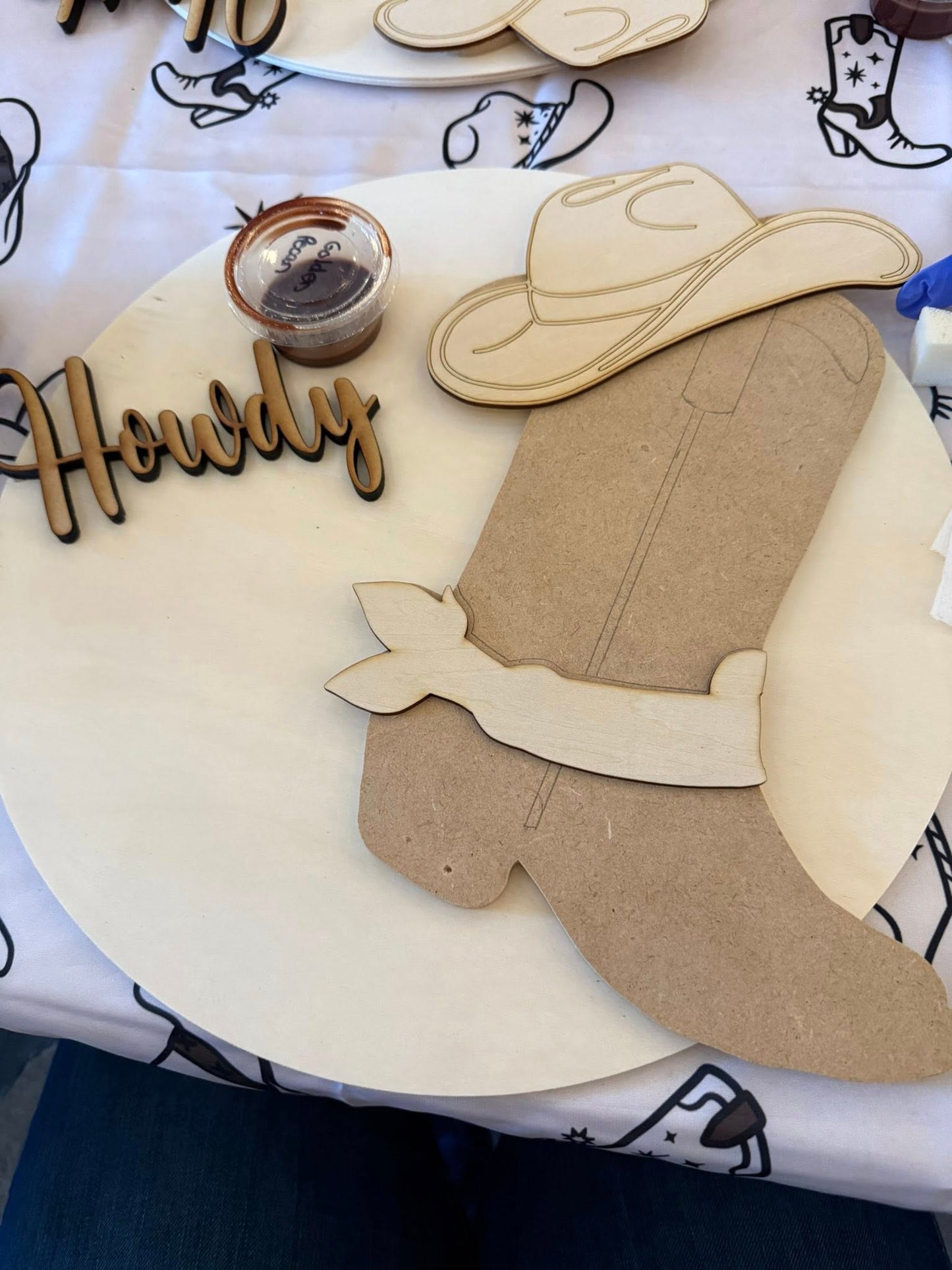 Western-themed craft project setup during a Sip and Paint event at Rodeo Stables in Ormond Beach, Florida.
